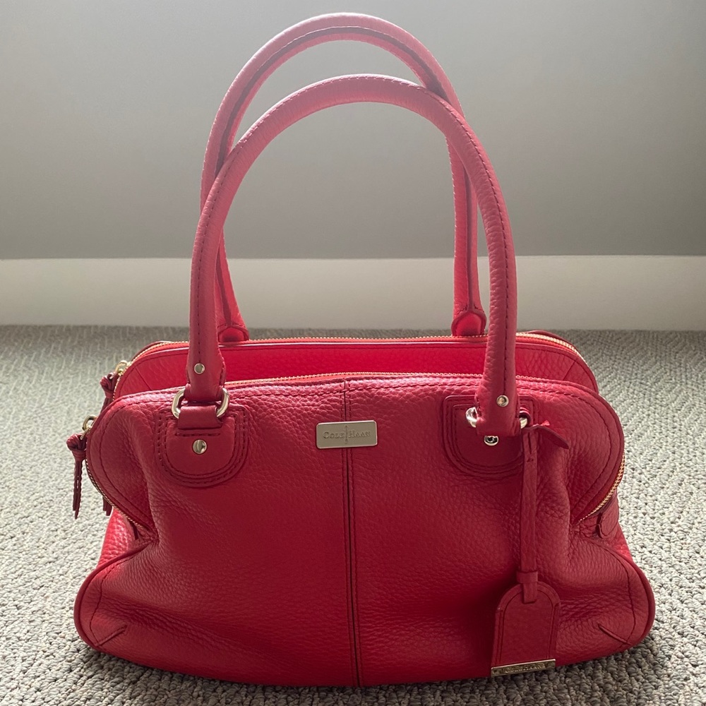 Red Cole Haan shoulder bag and dust bag